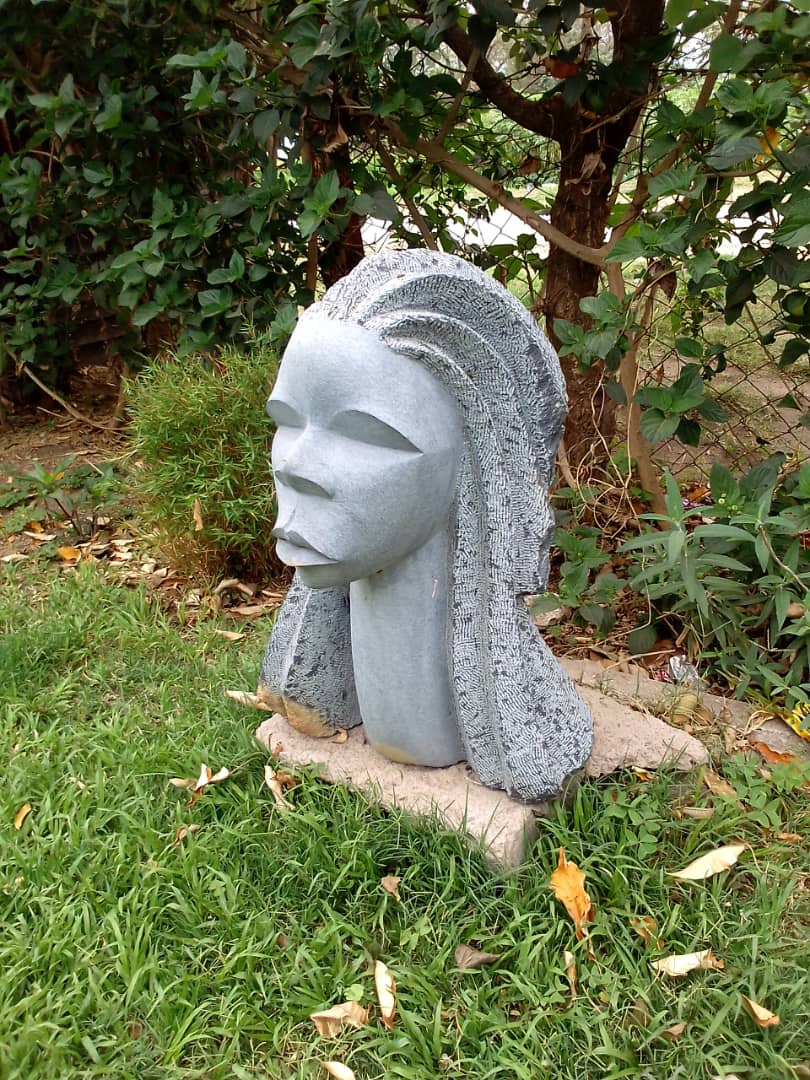 Face Carved from Morning Silence